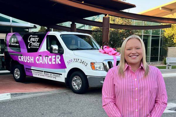 ally moore with the crush cancer van